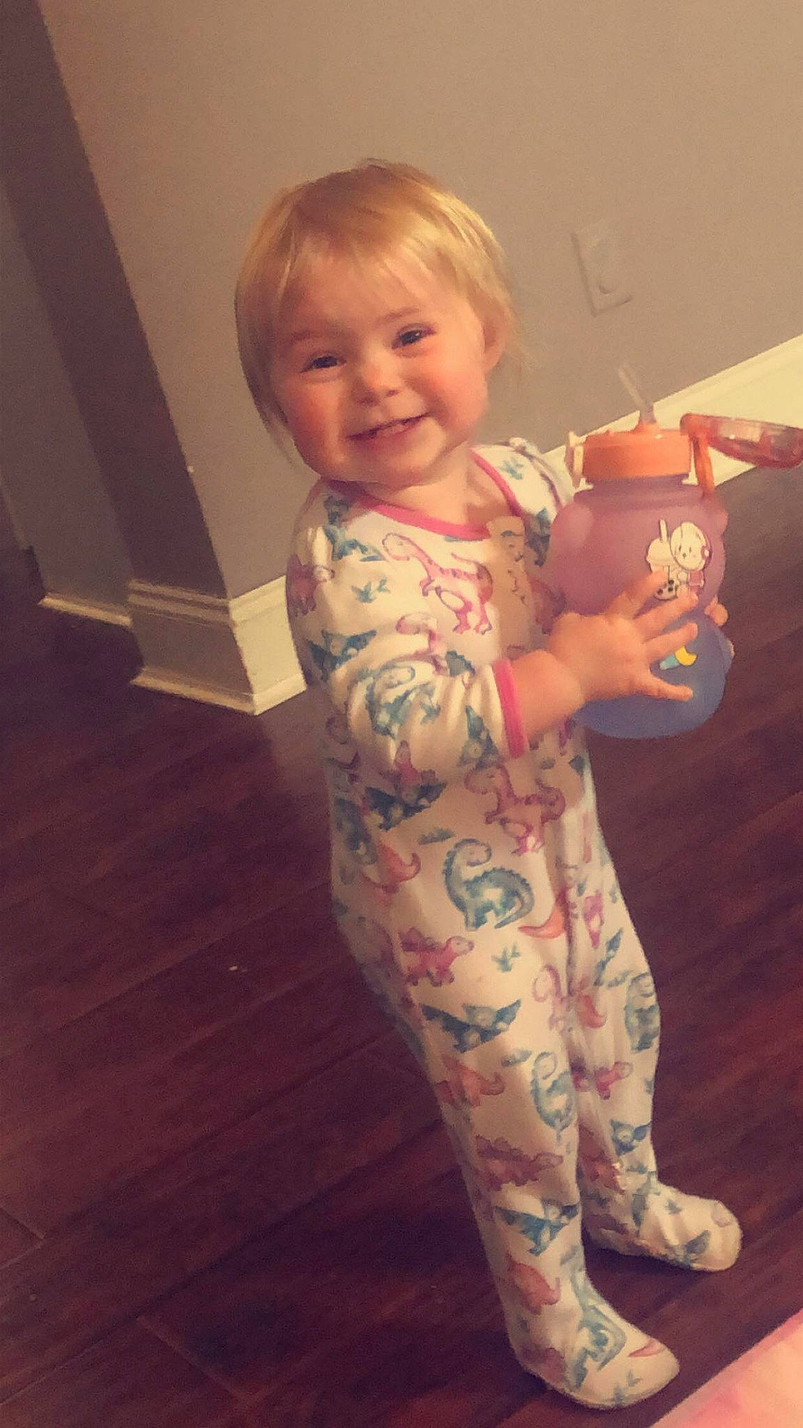 Carmen is registered to the contest to win money with this photo: arm, baby, baby_toddler_clothing, cheek, child, finger, floor, flooring, fun, hairstyle, head, human_body, joy, mouth, person, skin, sleeve, smile, thigh, thumb