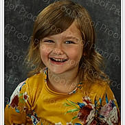 Sophia joined the competition — help win amazing prizes! child, girl, portrait, smiling, laughing, gap_tooth, floral_dress, yellow_clothing, brown_hair, pigtails, headshot, studio, backdrop, indoors, happy, face, teeth, eyes, photography, watermark