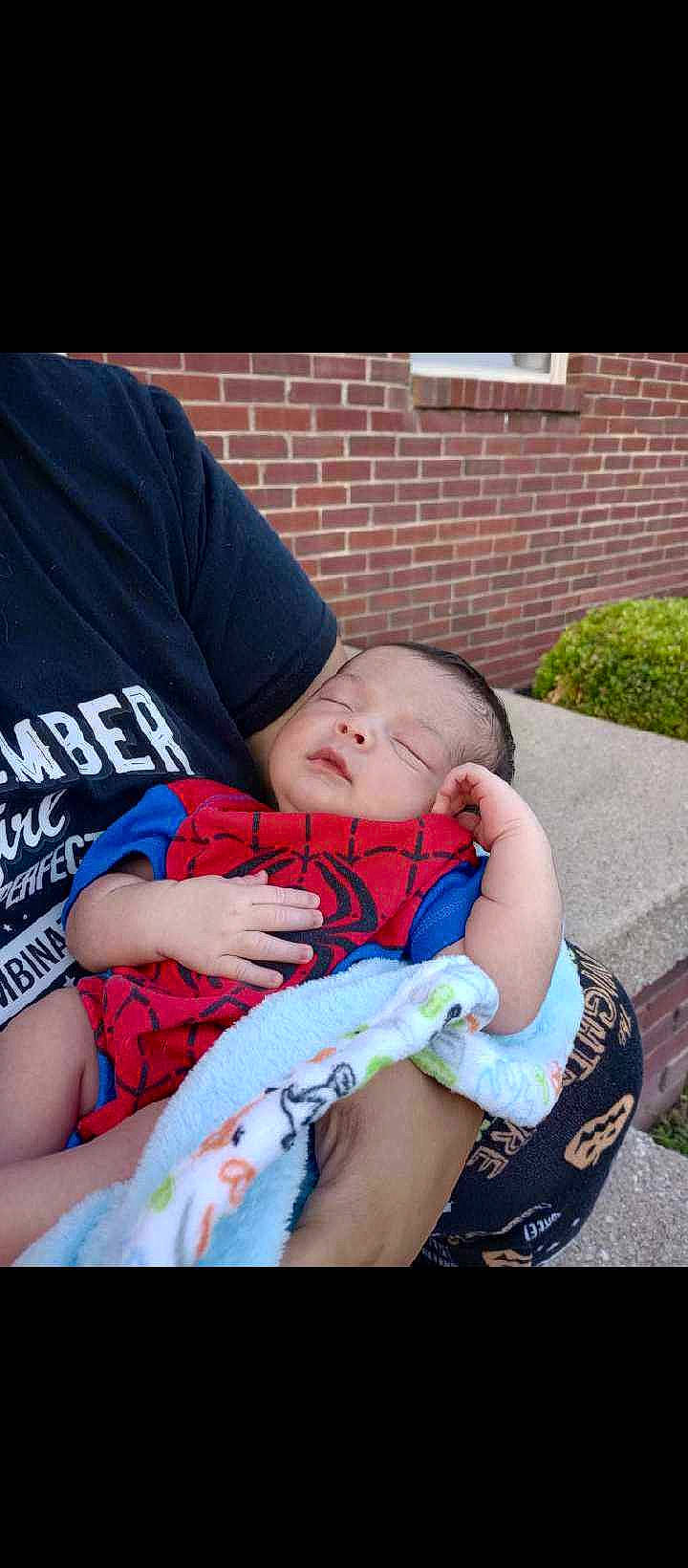 Corvin joined the competition — help win amazing prizes! abdomen, baby, baby_carriage, baby_products, baby_toddler_clothing, brick, child, comfort, electric_blue, fun, grass, happy, lap, leisure, pattern, person, plant, sitting, thigh, toddler