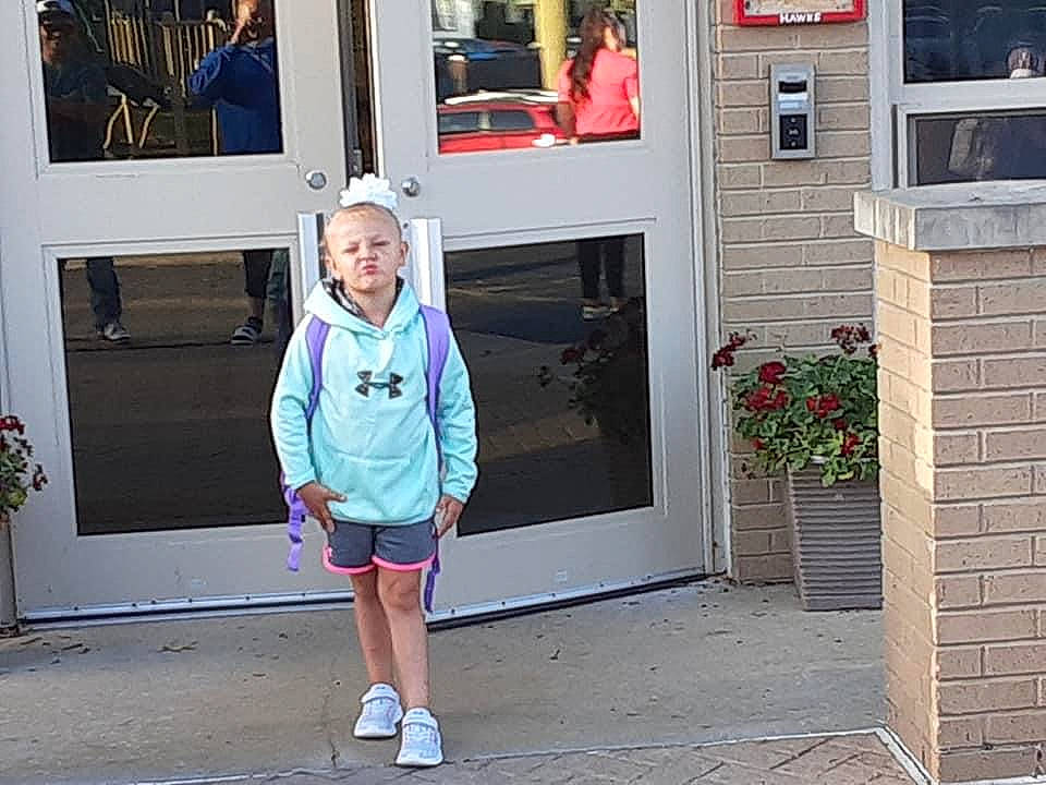 Mireya is registered to the contest to win money with this photo: building, city, door, electric_blue, event, facade, fun, house, jacket, leisure, magenta, pedestrian, person, plant, room, sidewalk, street, toddler, tree, vacation