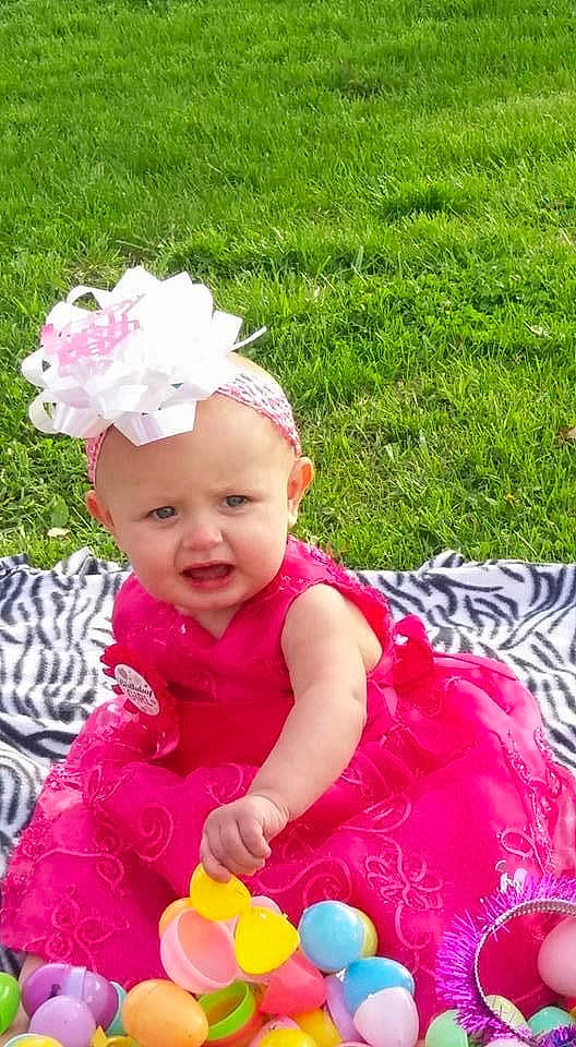 Mireya joined the competition — help win amazing prizes! baby, baby_toddler_clothing, child, event, face, fun, grass, green, happy, headband, headgear, headpiece, headwear, leisure, magenta, people_in_nature, person, petal, pink, plant