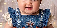 Dallas joined the competition — help win amazing prizes! baby, child, smiling, headband, bow, denim_dress, lace, portrait, cute, happy, infant, fashion, studio, soft_lighting, closeup, adorable, face, person, indoor, background_blur