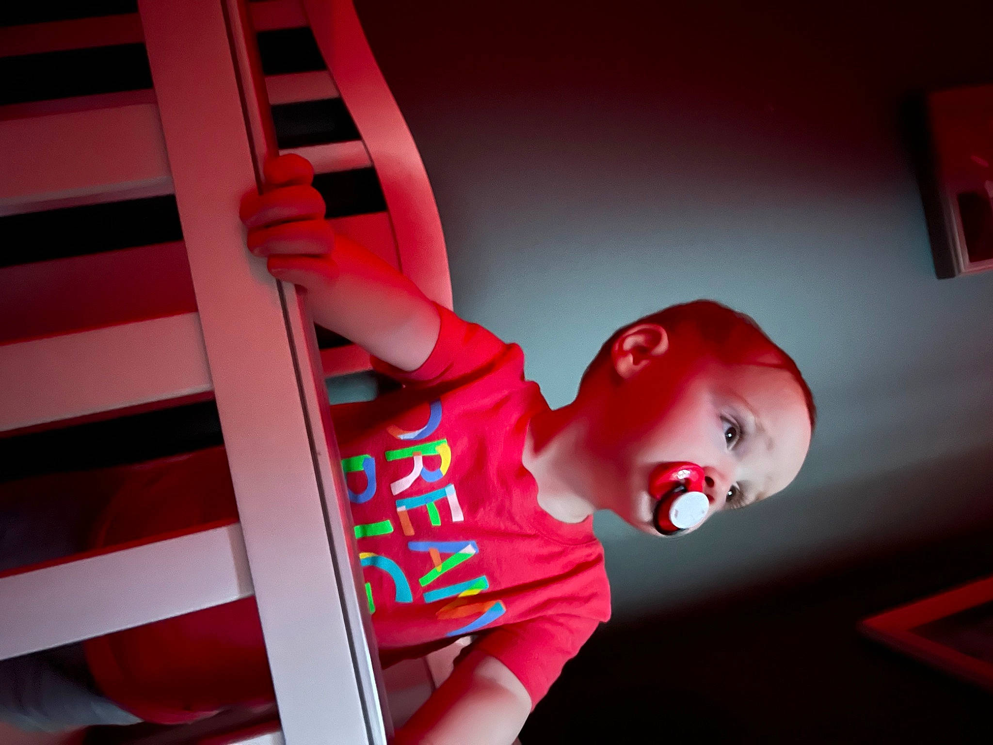 Grayson is registered to the contest to win money with this photo: animation, art, carmine, child, elbow, eyewear, fictional_character, fun, human_leg, machine, magenta, person, personal_protective_equipment, room, t_shirt, toddler, window