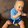 Ajion joined the competition — help win amazing prizes! baby, child, smiling, blue_shirt, navy_shorts, pacifier, sitting, couch, brown_couch, happy, cute, infant, indoors, playful, sock, person, portrait, toddler, clothing, seat