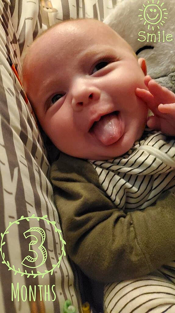 Gavyn is registered to the contest to win money with this photo: baby, cheek, chin, comfort, eyebrow, face, facial_expression, forehead, gesture, happy, head, iris, lip, mammal, mouth, nose, person, skin, sleeve, smile
