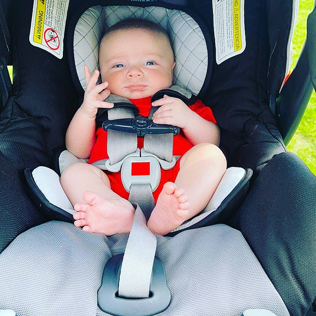 Gavyn joined the competition — help win amazing prizes! auto_part, baby, baby_in_car_seat, baby_products, baby_toddler_clothing, car_seat, car_seat_cover, comfort, finger, head_restraint, human_leg, knee, lap, leg, nail, person, seat_belt, sitting, steering_wheel, thigh