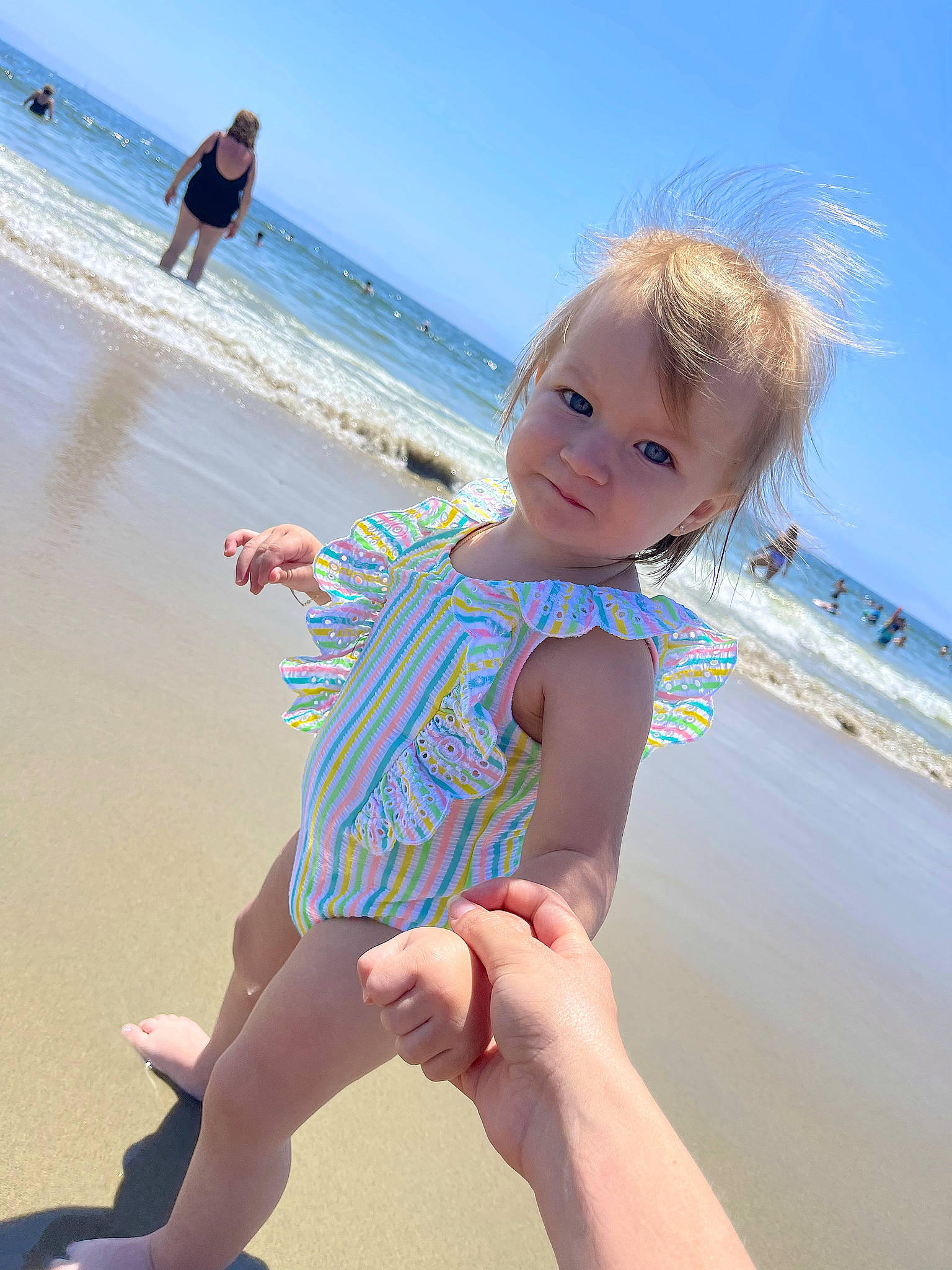 Alice joined the competition — help win amazing prizes! azure, barefoot, beach, beauty, blue, fun, happy, human_leg, leg, leisure, people_in_nature, people_on_beach, person, sand, sky, smile, summer, sunlight, thigh, toddler