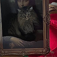 Katniss joined the competition — help win amazing prizes! animal, art, cat, classic_art, creative, curtain, decor, face_blend, feline, frame, fur, green_trim, household, indoor, mona_lisa, painting, portrait, red_cloth, table, wood_floor