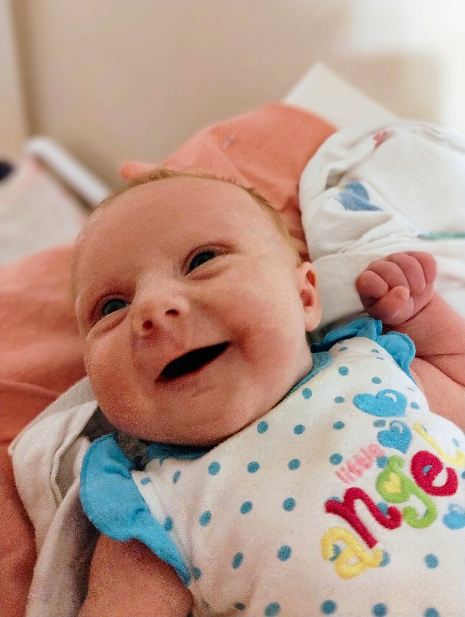 Myah is registered to the contest to win money with this photo: baby, baby_laughing, baby_products, baby_sleeping, baby_toddler_clothing, cheek, child, comfort, happy, hat, laugh, linens, pattern, peach, person, pink, room, skin, sleeve, smile