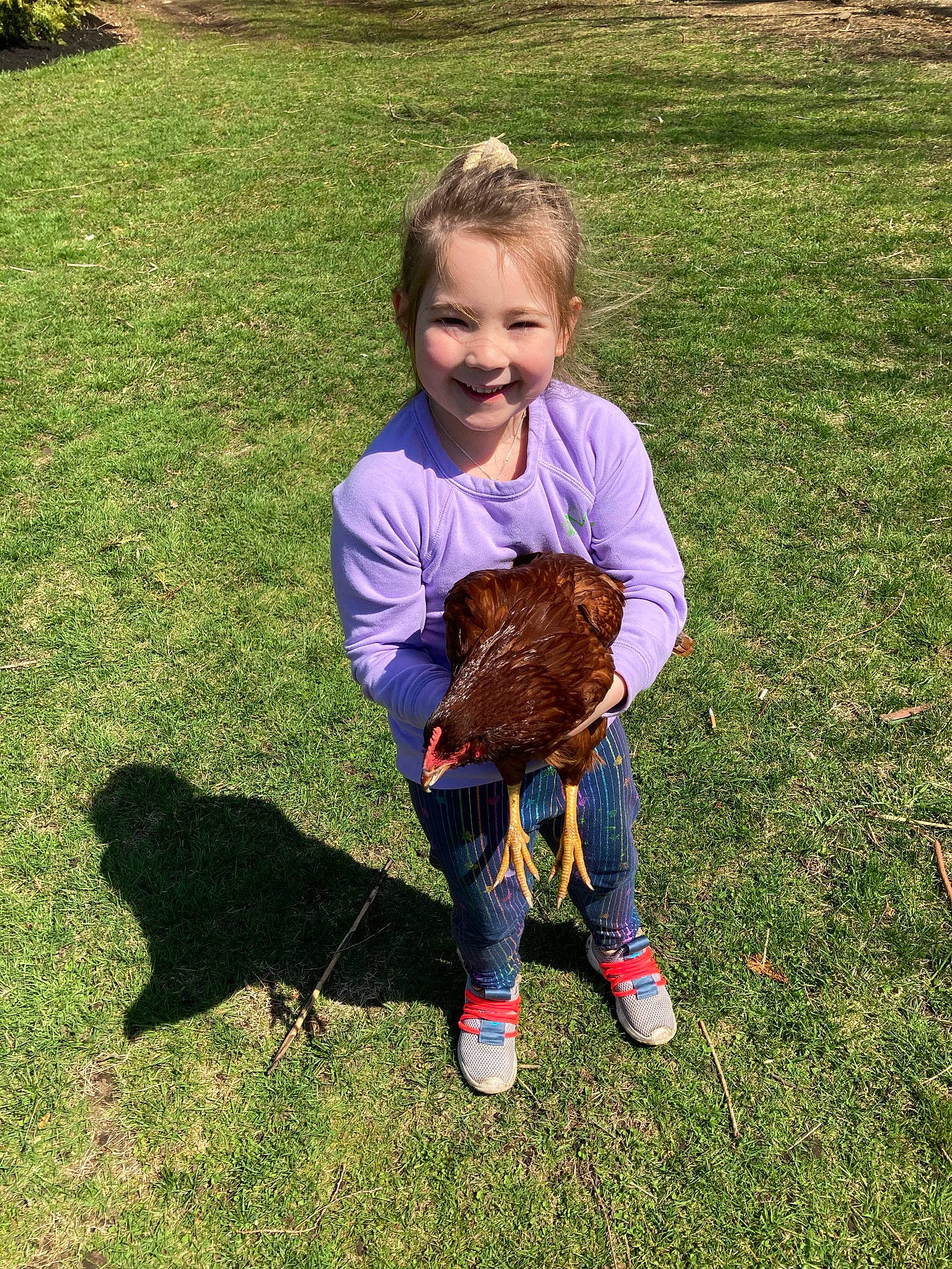 Charlee Sue is registered to the contest to win money with this photo: baby_toddler_clothing, botany, child, glove, grass, grass_family, grassland, groundcover, happy, joy, lawn, leaf, mammal, pattern, people_in_nature, person, plant, sleeve, smile, soil