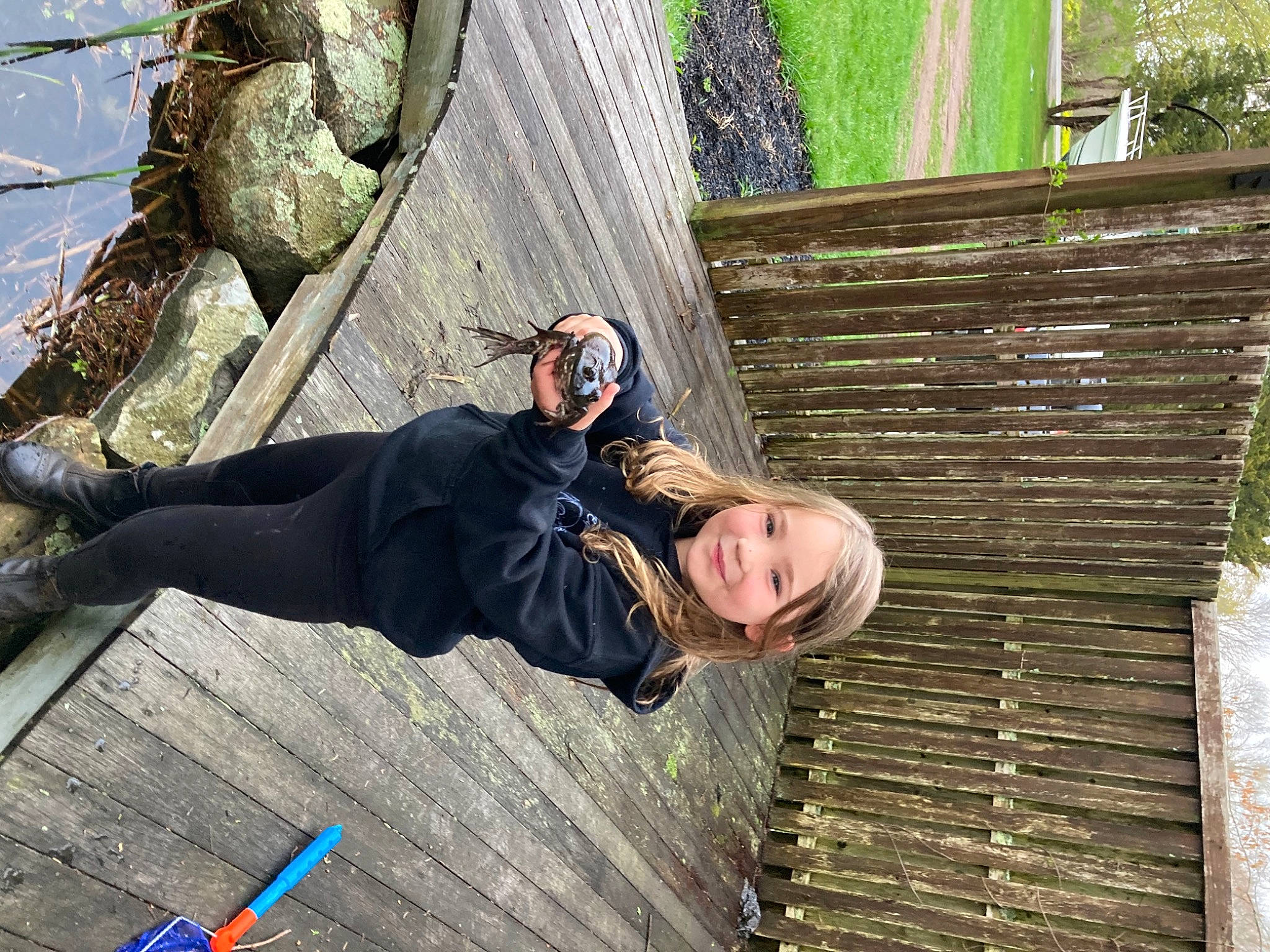 Charlee Sue joined the competition — help win amazing prizes! adventure, fun, grass, jacket, joy, leisure, people_in_nature, person, recreation, sitting, smile, street_fashion, tree, trunk, wood, woody_plant