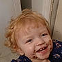 Aubrianna joined the competition — help win amazing prizes! toddler, child, smiling, chocolate, messy, curly_hair, blonde, blue_dress, floral_pattern, indoor, face, happy, cute, person, young_child, laughing, messy_face, portrait, clothing, small_child