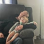 Aubrianna joined the competition — help win amazing prizes! child, adult, sleeping, armchair, indoor, cozy, family, rest, curtain, carpet, beard, casual_clothing, light, window, hand, comfort, relaxation, toddler, person, nap