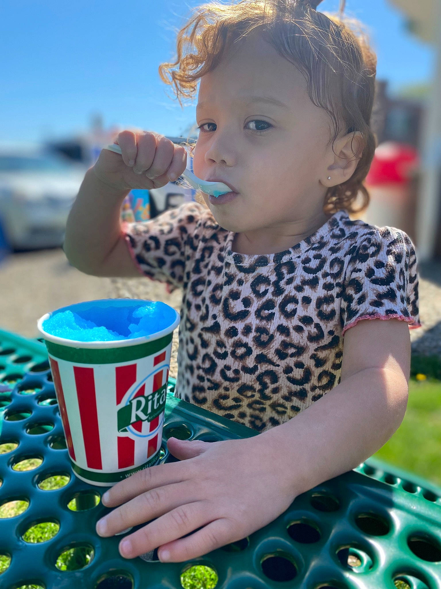 Nala is registered to the contest to win money with this photo: baby_playing_with_toys, baby_toddler_clothing, blue, child, drink, drinkware, electric_blue, finger, fun, green, happy, leisure, person, photograph, play, public_space, recreation, sky, summer, t_shirt