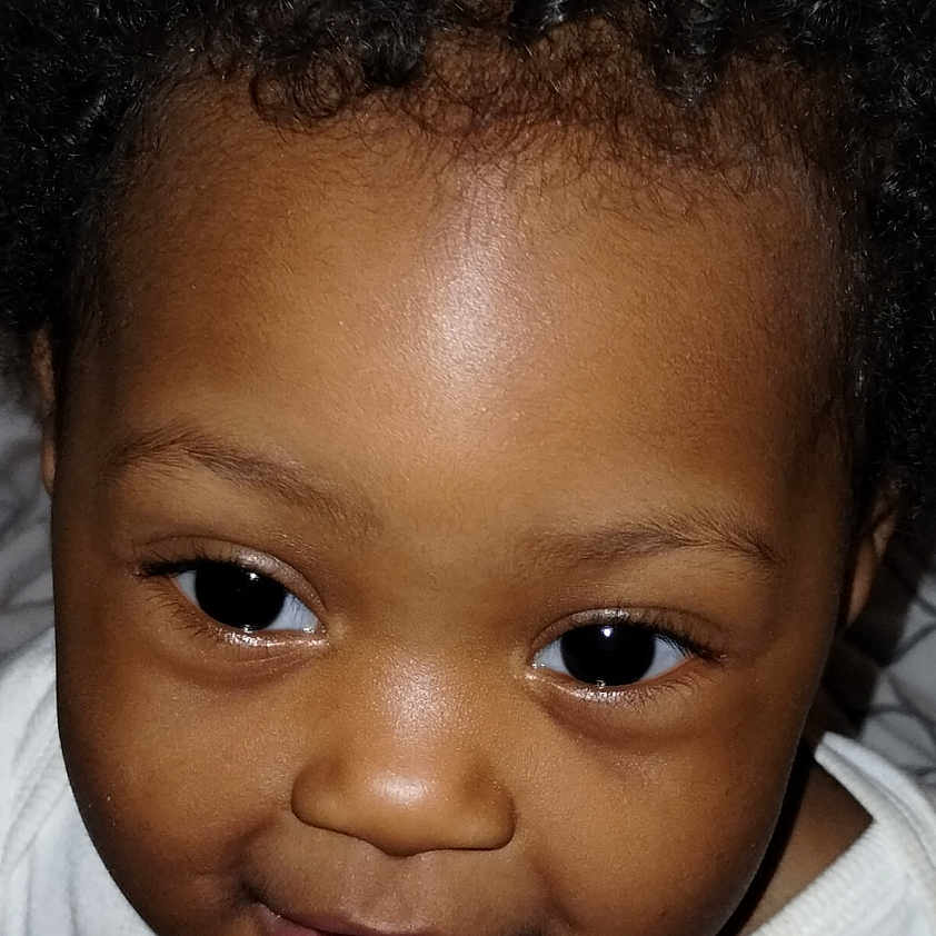 Elizabeth Grace is registered to the contest to win money with this photo: adorable, baby, baby_face, cheeks, child, closeup, curly_hair, cute, expression, eyes, face, head, human, infant, person, portrait, skin, smile, white_shirt, young_child