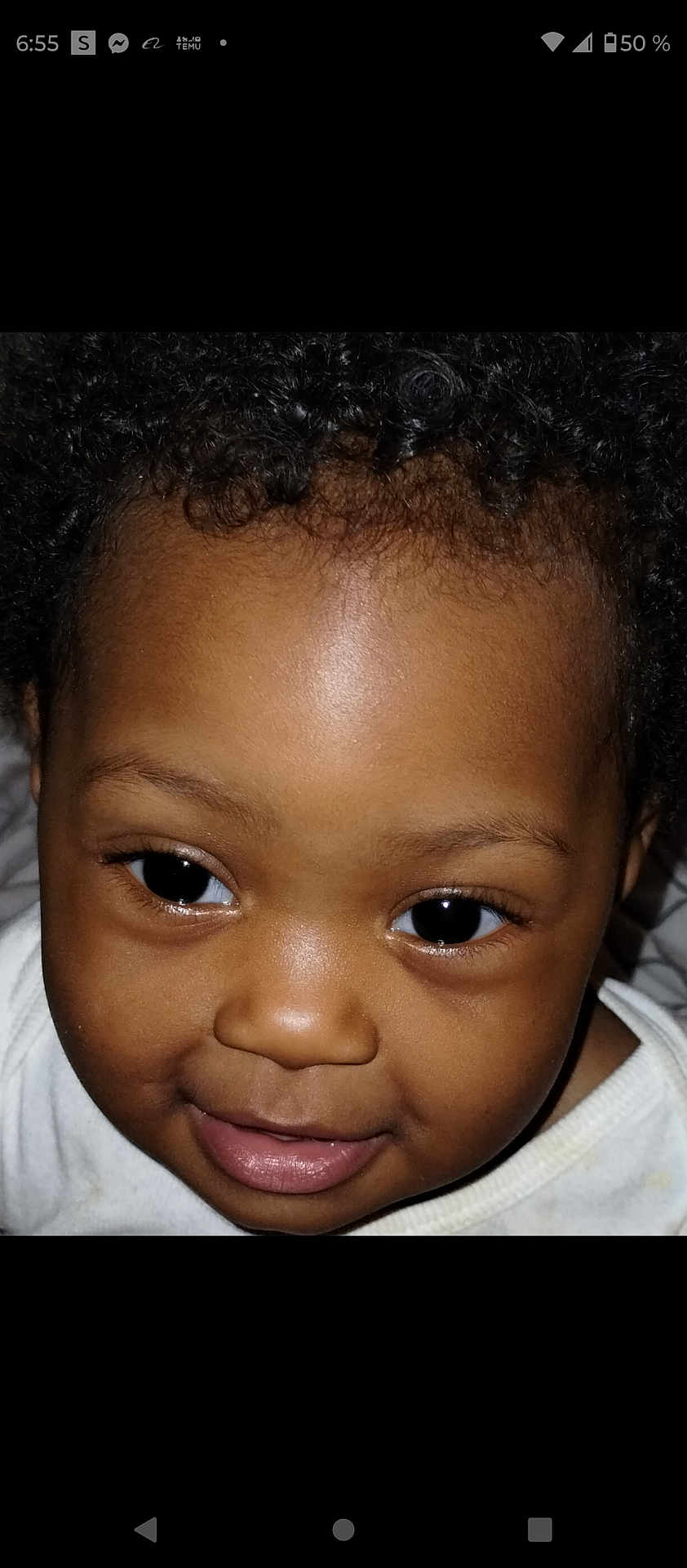 Elizabeth Grace is registered to the contest to win money with this photo: baby, child, face, smile, curly_hair, eyes, skin, portrait, cute, infant, closeup, white_shirt, young_child, expression, cheeks, head, person, human, baby_face, adorable