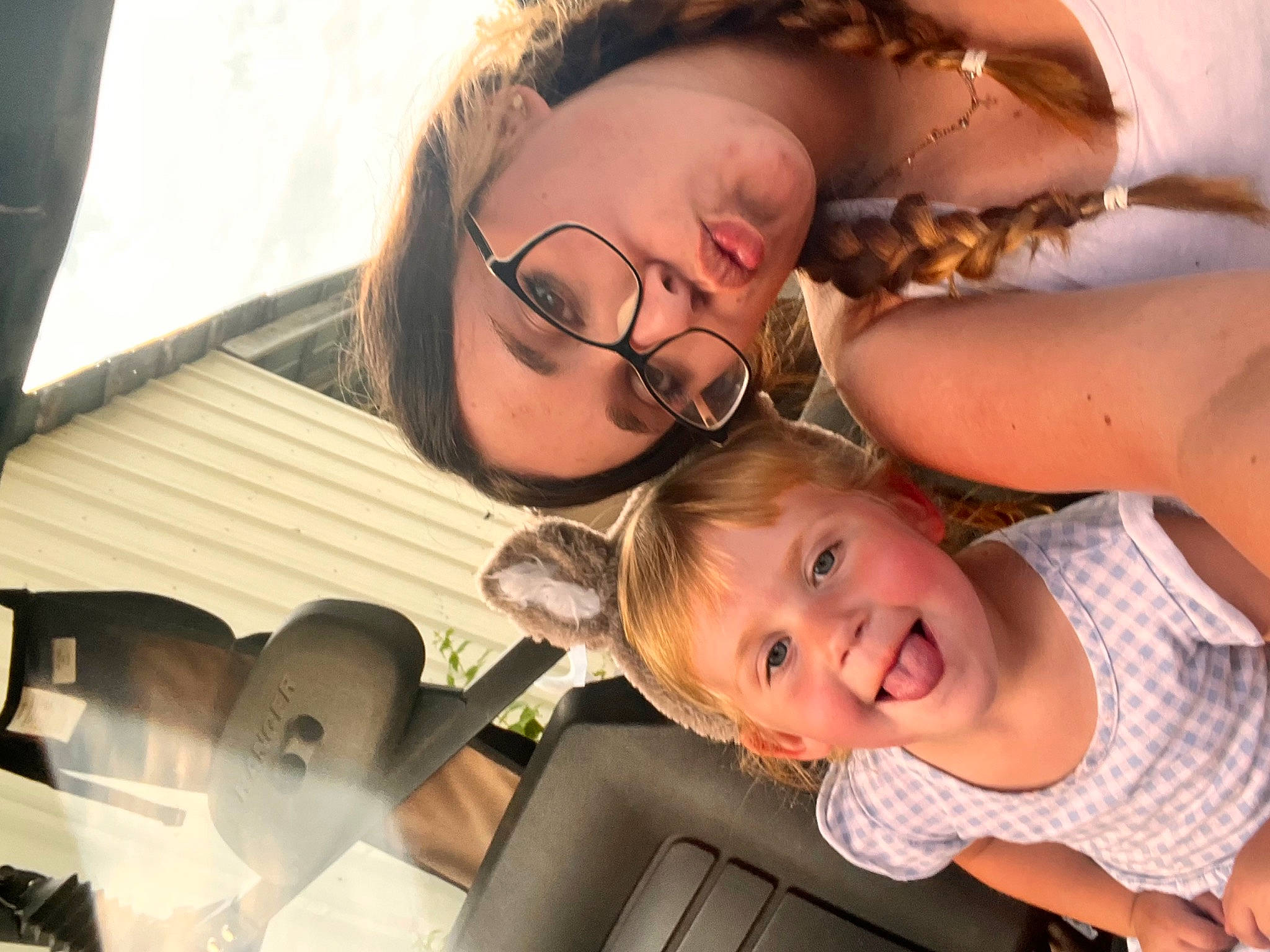 Freya is registered to the contest to win money with this photo: child, comfort, event, eyewear, facial_expression, friendship, fun, gesture, glasses, grass, happy, joy, leisure, mouth, organ, person, skin, smile, toddler, tree