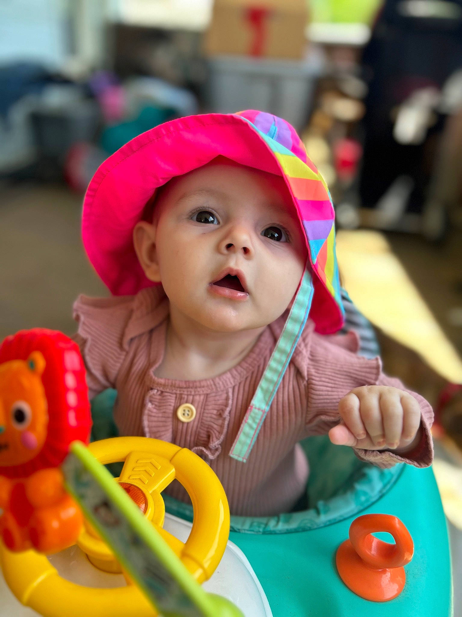Zoe joined the competition — help win amazing prizes! baby, baby_playing_with_toys, baby_toddler_clothing, child, facial_expression, fun, green, happy, headwear, leisure, organ, people, person, photograph, product, recreation, red, skin, snapshot, surprise