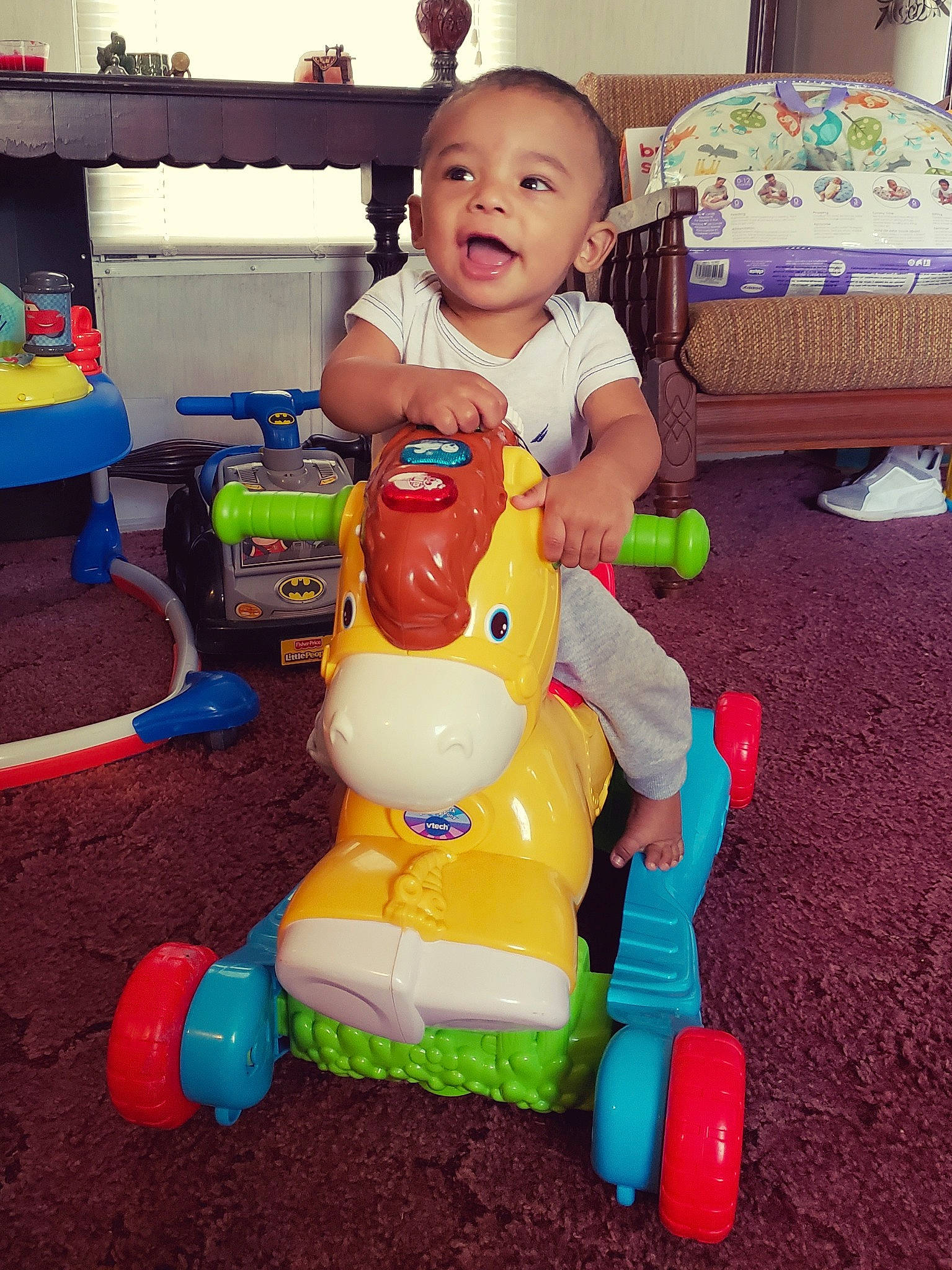 Santiago joined the competition — help win amazing prizes! baby_products, child, day, fun, infant, party_supply, person, play, product, sitting, skin, toddler, toy