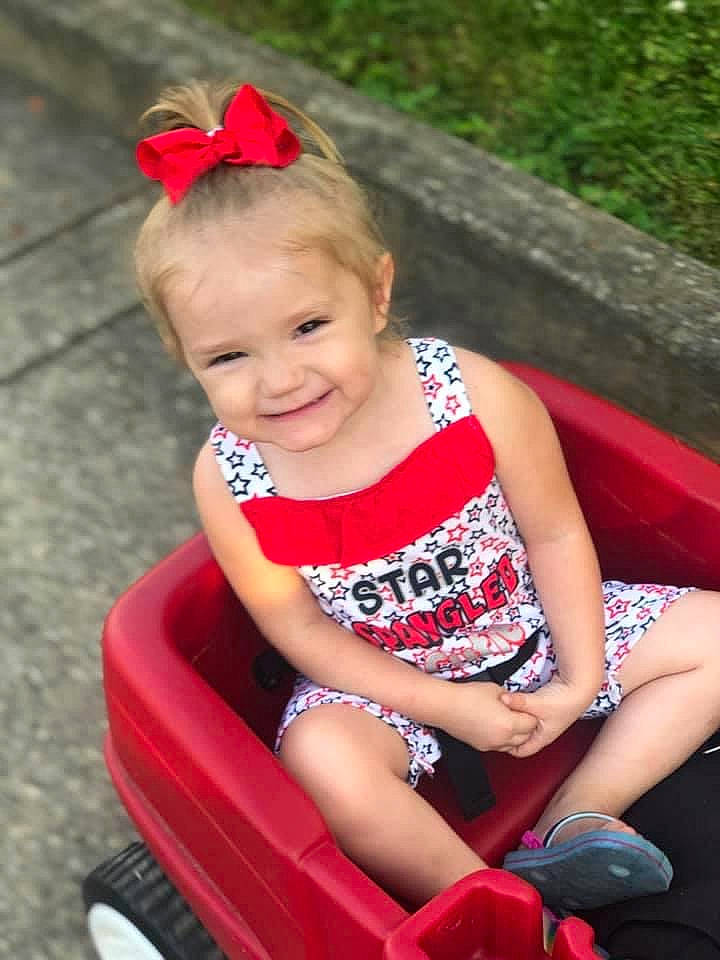 Ava joined the competition — help win amazing prizes! automotive_tire, baby_toddler_clothing, blond, child, fun, grass, hair, happy, human_leg, joy, leisure, magenta, person, pink, recreation, red, shorts, skin, smile, summer