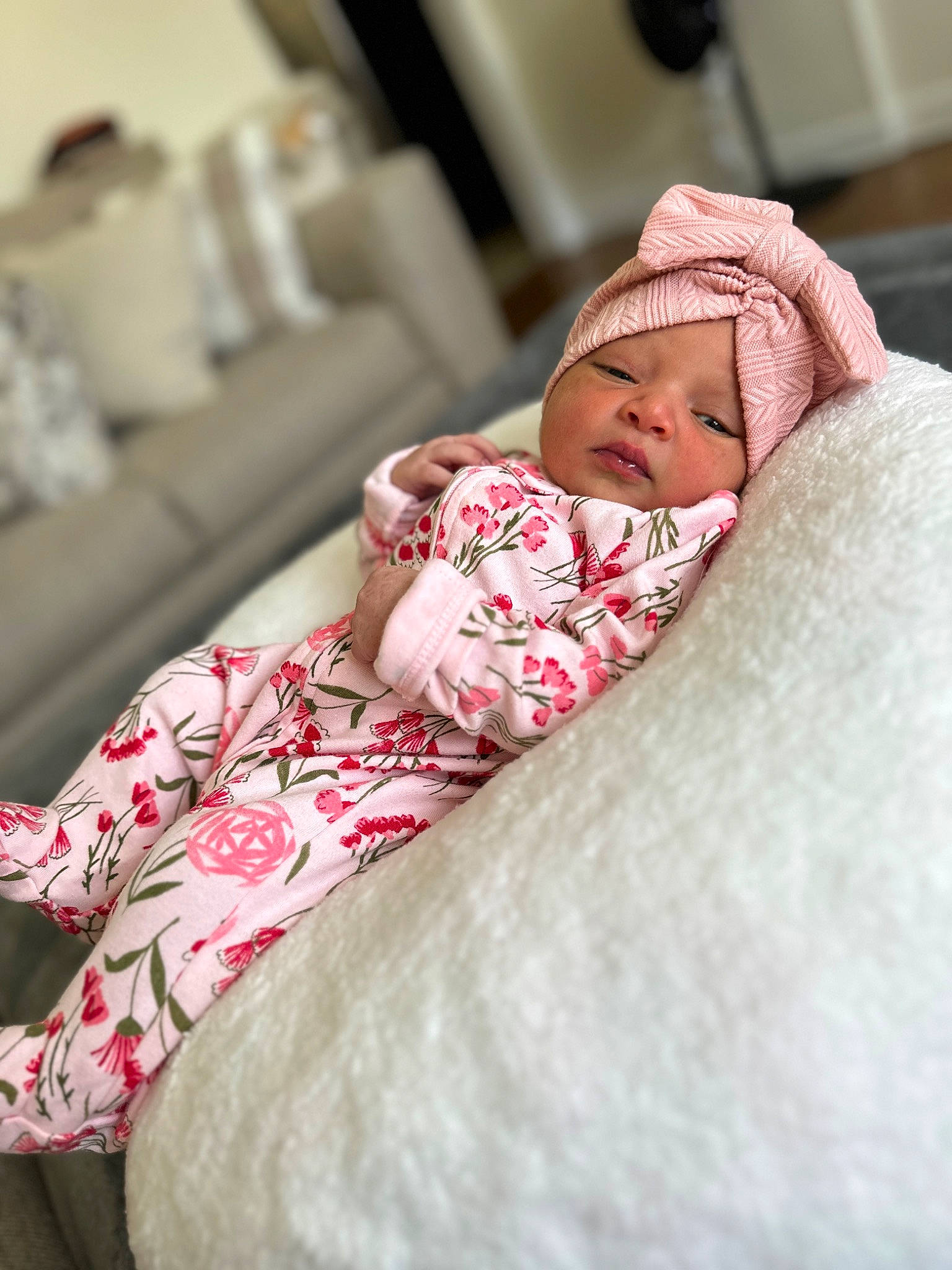Myla is registered to the contest to win money with this photo: baby, baby_sleeping, baby_toddler_clothing, bedding, bedtime, carmine, child, comfort, couch, event, hat, headwear, human_leg, linens, nap, pattern, person, pink, room, skin