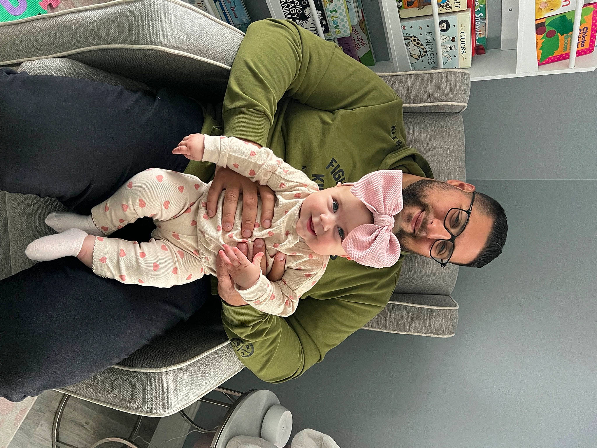 Valentina is registered to the contest to win money with this photo: art, baby, baby_products, child, comfort, couch, fun, happy, headwear, joy, lap, nap, person, picture_frame, pillow, room, shelf, sitting, toddler