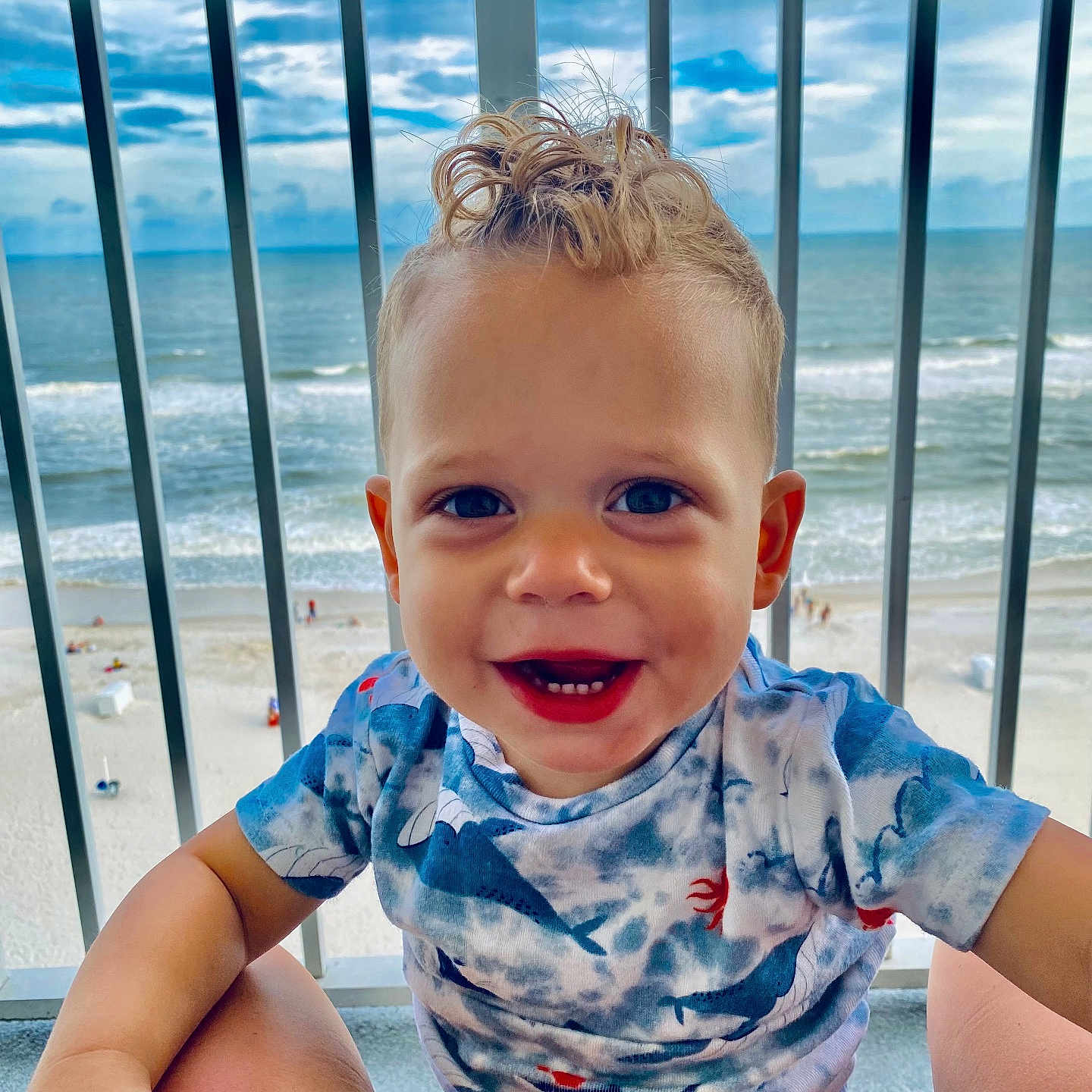 Hendrix joined the competition — help win amazing prizes! baby, beach, clothing, coast, face, fence, happy, head, nature, outdoors, person, photography, portrait, sea, shoreline, sky, summer, t_shirt, water, waterfront