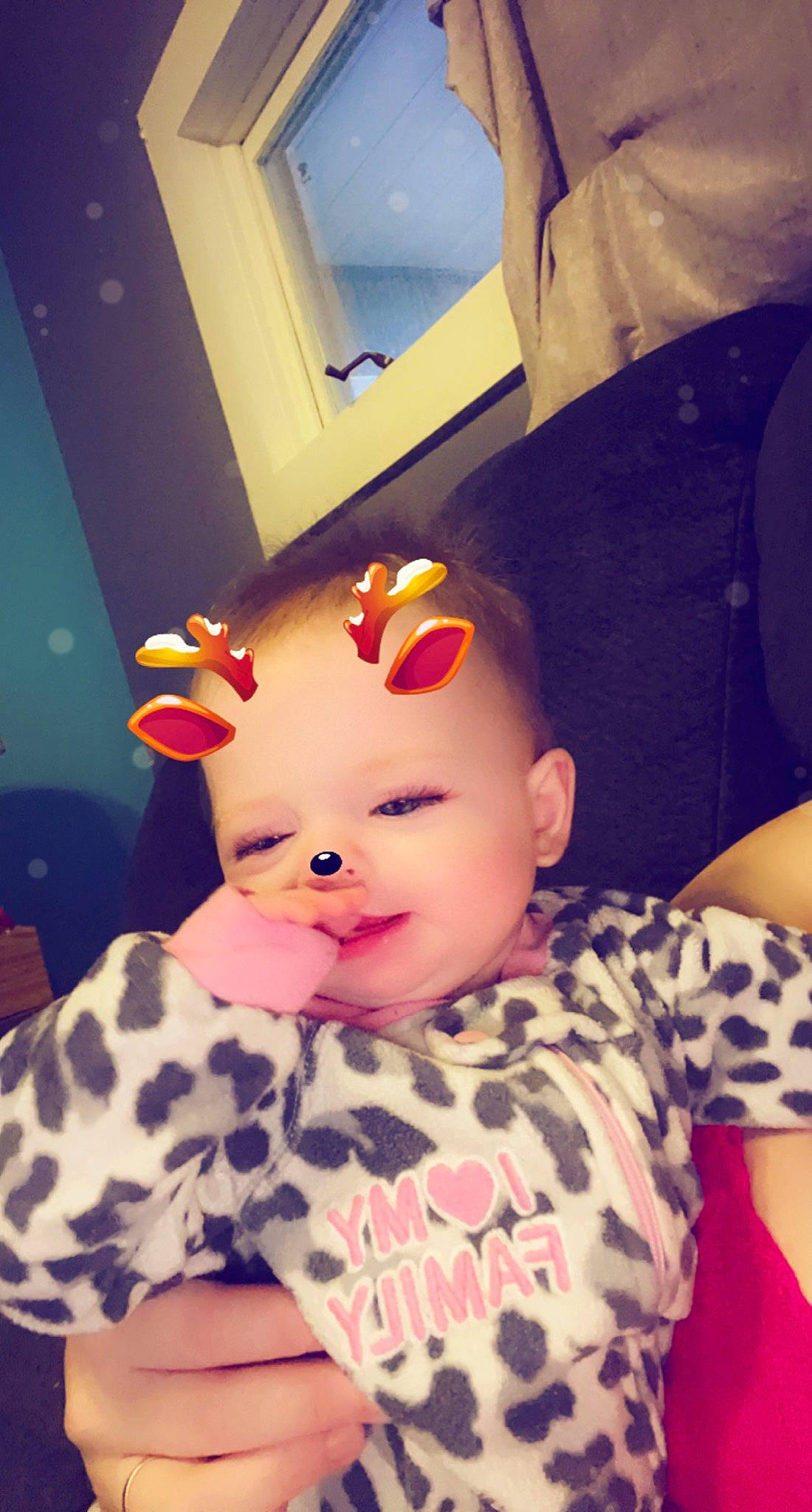 Aurora is registered to the contest to win money with this photo: baby, baby_toddler_clothing, cheek, child, comfort, cool, couch, eyelash, finger, fun, goggles, happy, headwear, nose, pattern, person, room, selfie, sitting, sleeve