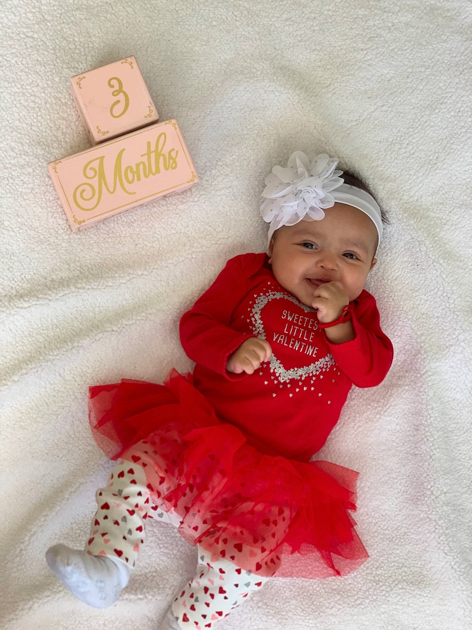 Jayleen joined the competition — help win amazing prizes! baby, baby_products, baby_toddler_clothing, child, hair_accessory, headgear, headwear, pattern, person, pink, product, red, smile, toddler