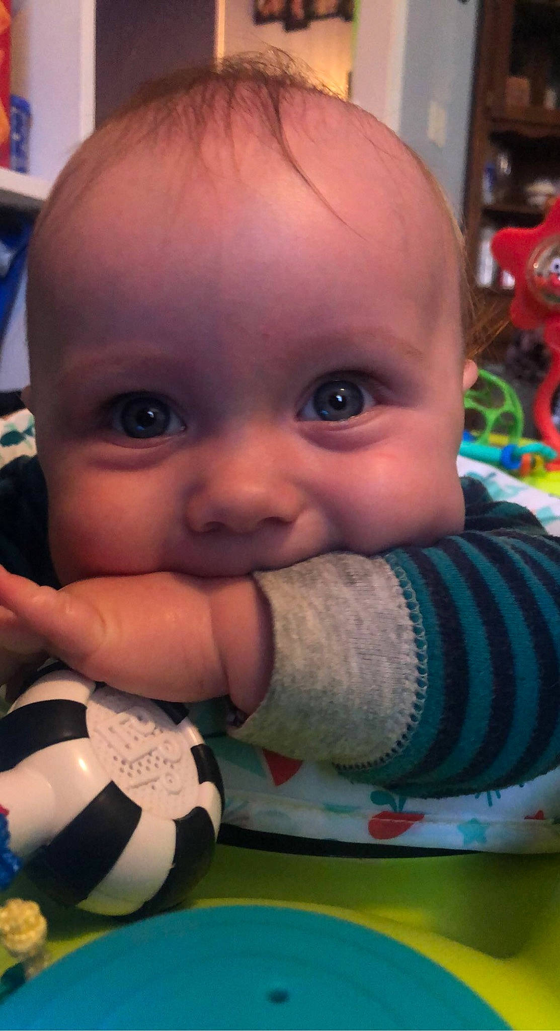 Myles is registered to the contest to win money with this photo: baby, baby_toddler_clothing, cheek, child, chin, ear, eyebrow, eyelash, finger, forehead, fun, hand, iris, lip, mouth, nail, nose, person, skin, thumb