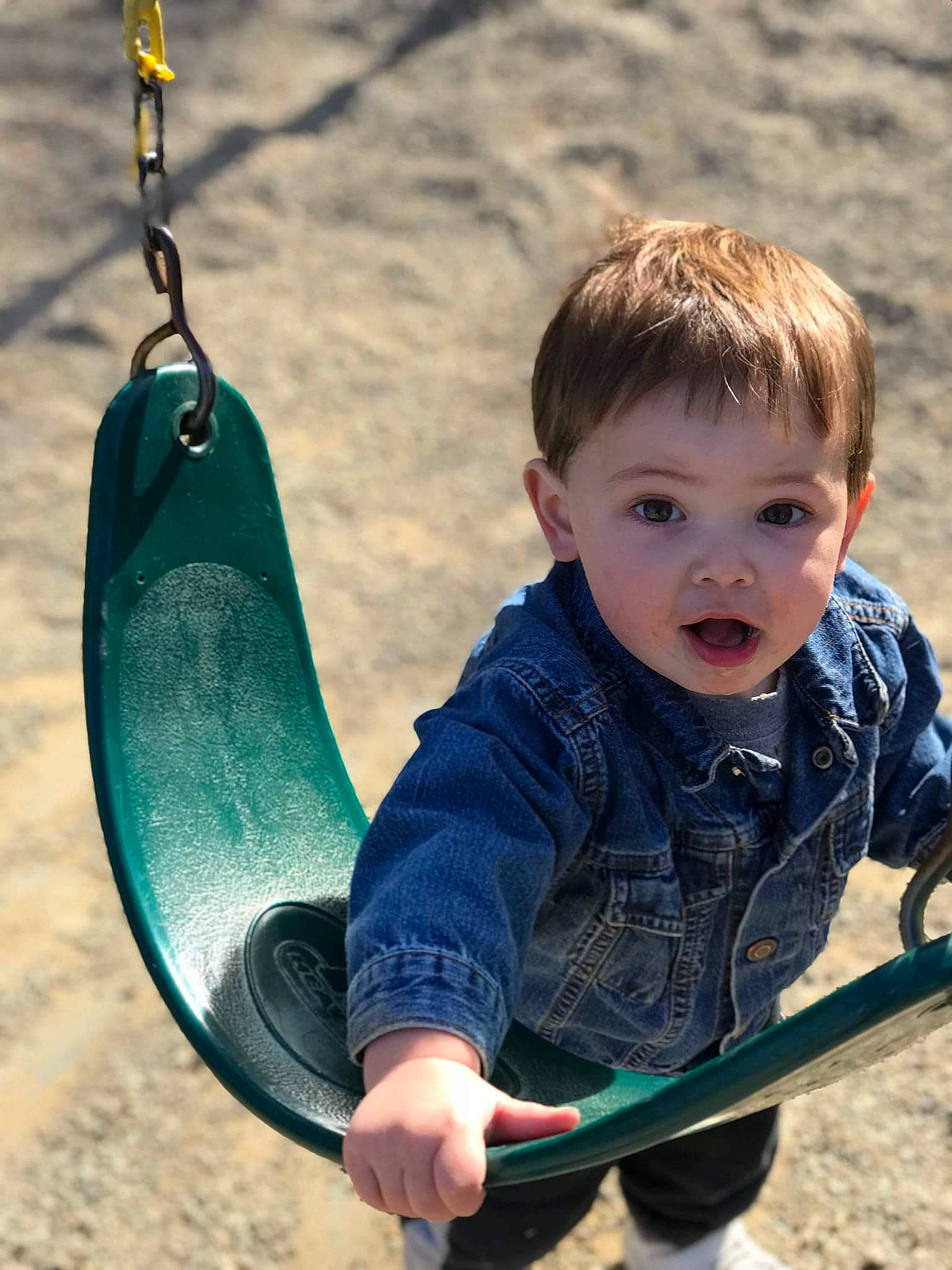 Edward joined the competition — help win amazing prizes! child, fun, jeans, leisure, outdoor_play_equipment, person, play, playground, public_space, recreation, sand, smile, surprise, swing, toddler