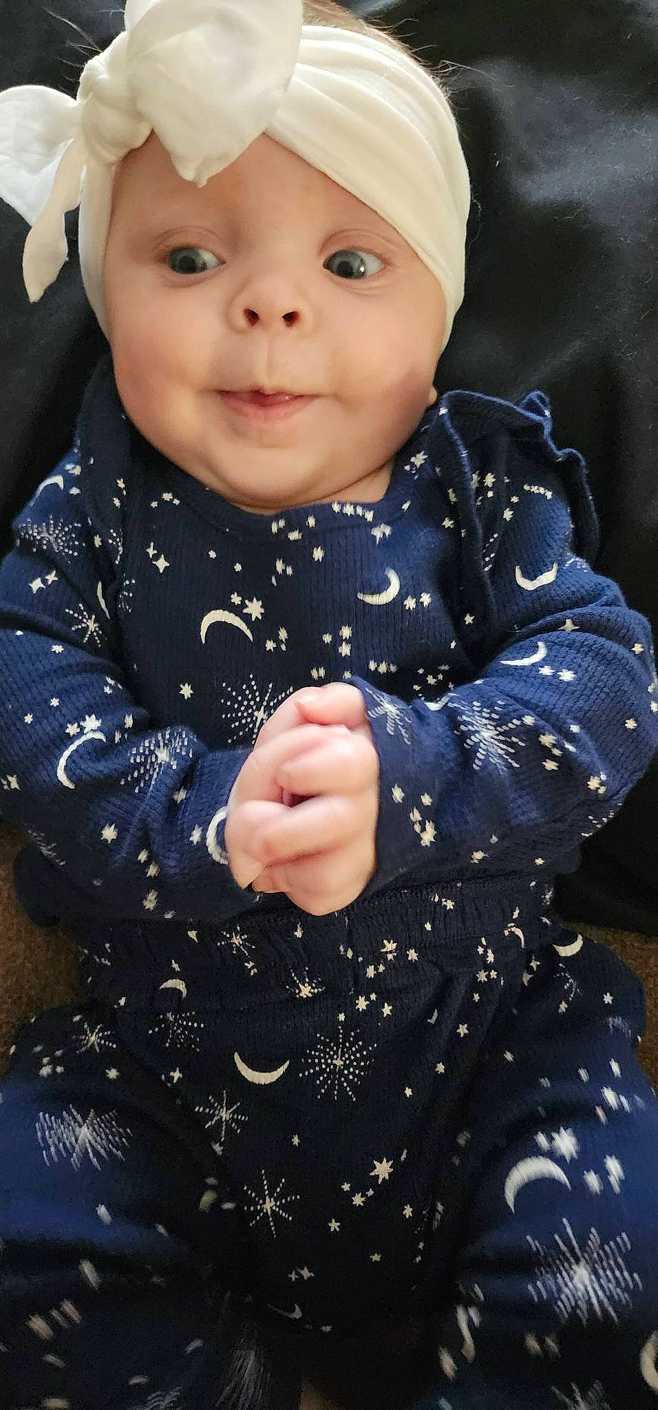 Indie joined the competition — help win amazing prizes! baby, baby_toddler_clothing, black, cheek, collar, cool, facial_expression, finger, gesture, hairstyle, happy, headwear, iris, lip, nose, outerwear, person, skin, sleeve, smile