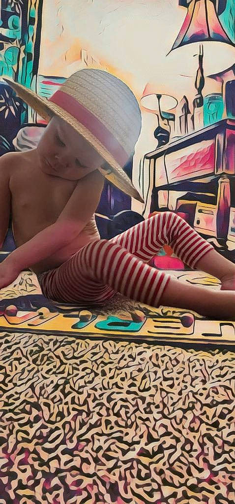 Sterling joined the competition — help win amazing prizes! art, cap, carpet, chest, eyewear, fashion_accessory, fedora, flooring, fun, hat, headwear, human_leg, leg, leisure, pattern, person, room, sitting, sun_hat, sunglasses