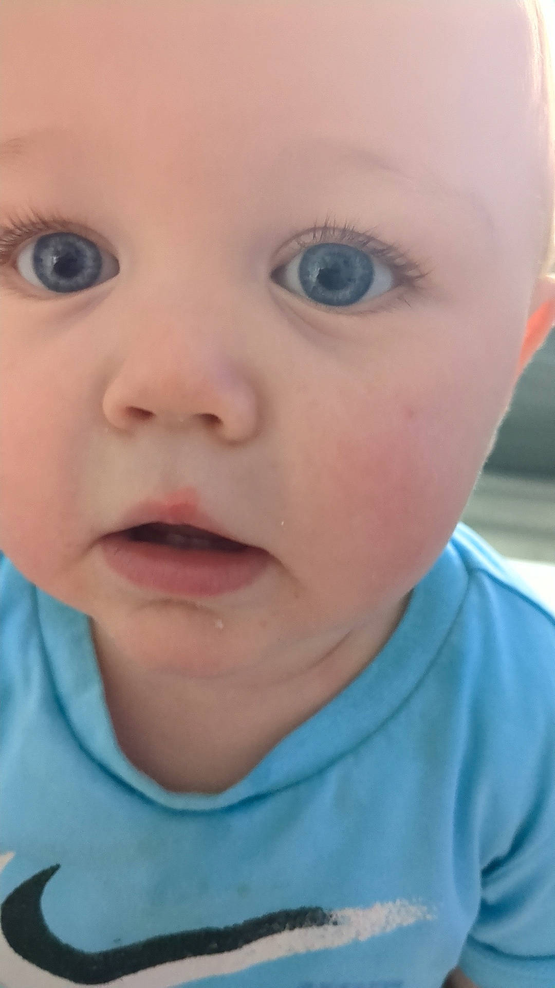 Kai-James is registered to the contest to win money with this photo: baby, blonde, bodypart, clothing, face, frown, hair, happy, head, laughing, mouth, newborn, person, photography, portrait, sad, selfie, smile, t_shirt, teeth