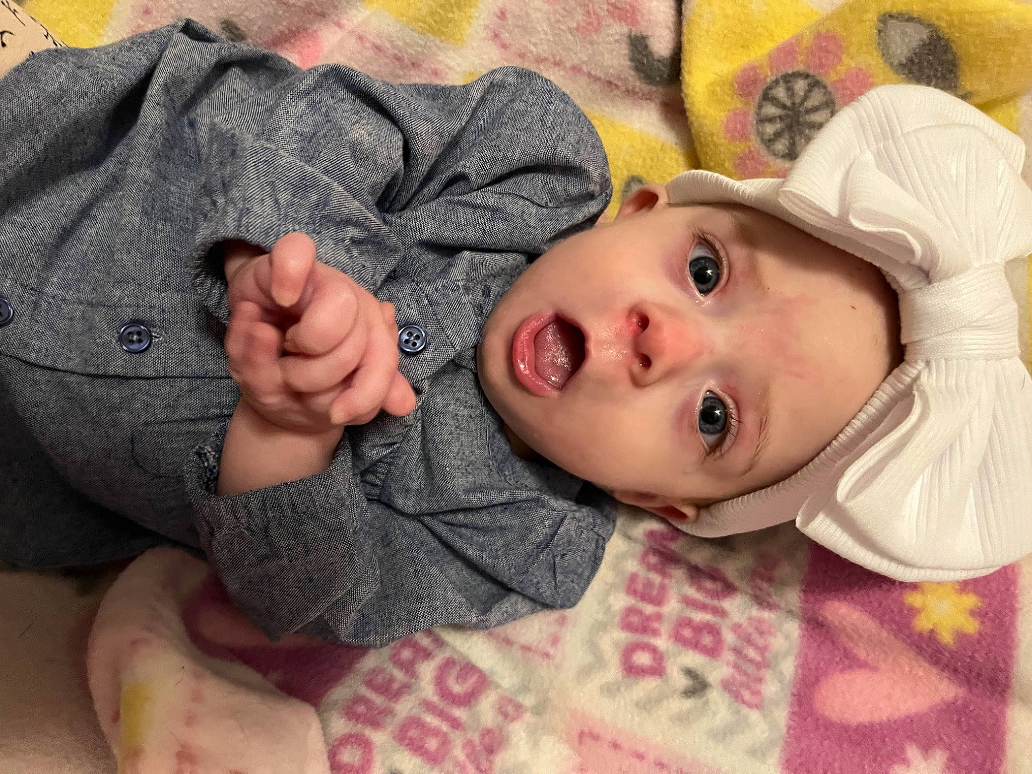 Emmy joined the competition — help win amazing prizes! baby, baby_toddler_clothing, cheek, comfort, eye, eyelash, face, gesture, happy, head, headgear, iris, lip, mouth, nose, person, skin, sleeve, smile, surprise