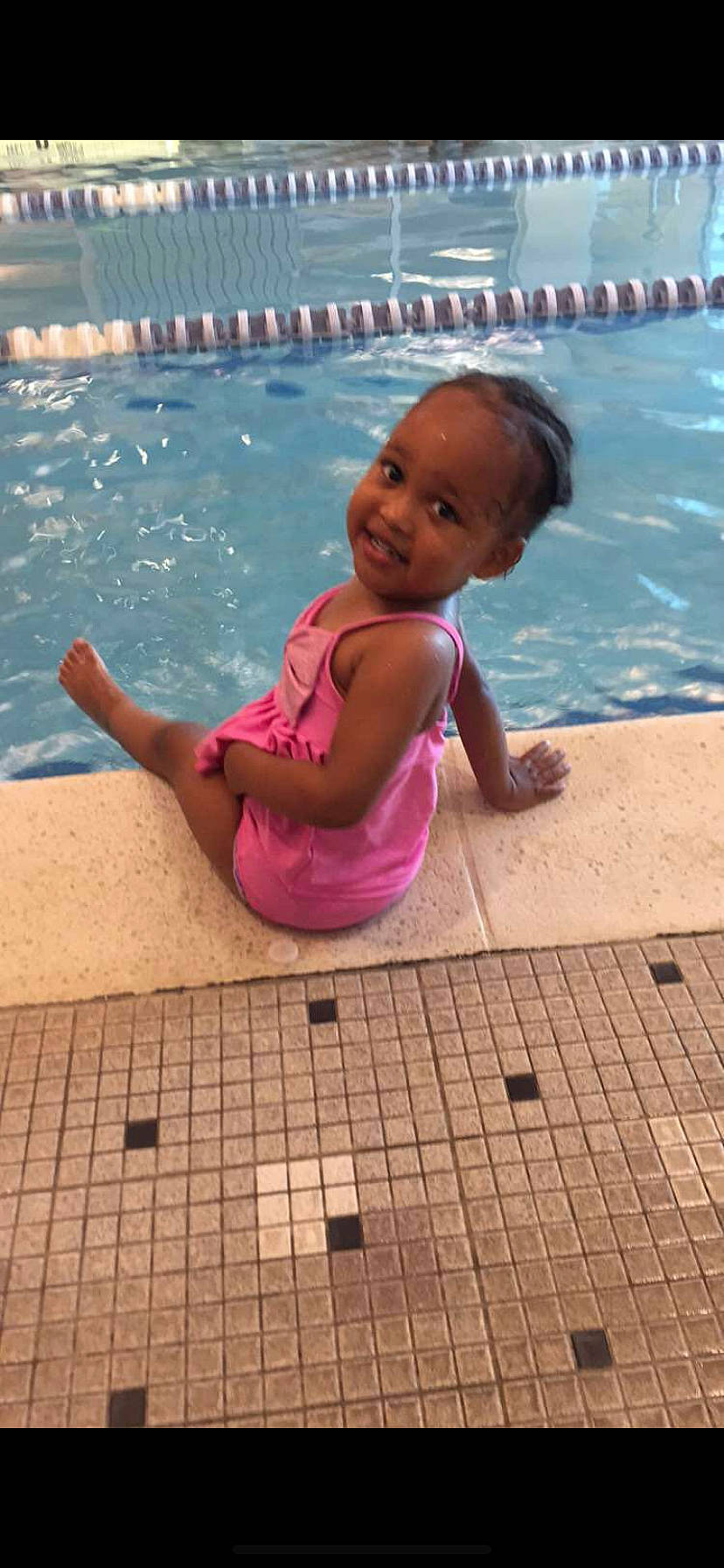 Myka is registered to the contest to win money with this photo: baby, child, fun, joy, leisure, person, pink, play, recreation, smile, summer, swimming_pool, toddler, vacation