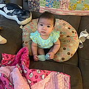 Priscilla joined the competition — help win amazing prizes! baby, blanket, bottle, child, clothing, couch, cute, face, furniture, green, indoor, infant, person, pillow, pink, polka_dot, quilt, sitting, soft, toy