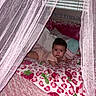 Priscilla joined the competition — help win amazing prizes! baby, bed, blanket, child, cozy, curtain, fabric, face, indoor, infant, lying_down, pattern, person, pillow, pink, portrait, rest, soft, window, window_blinds