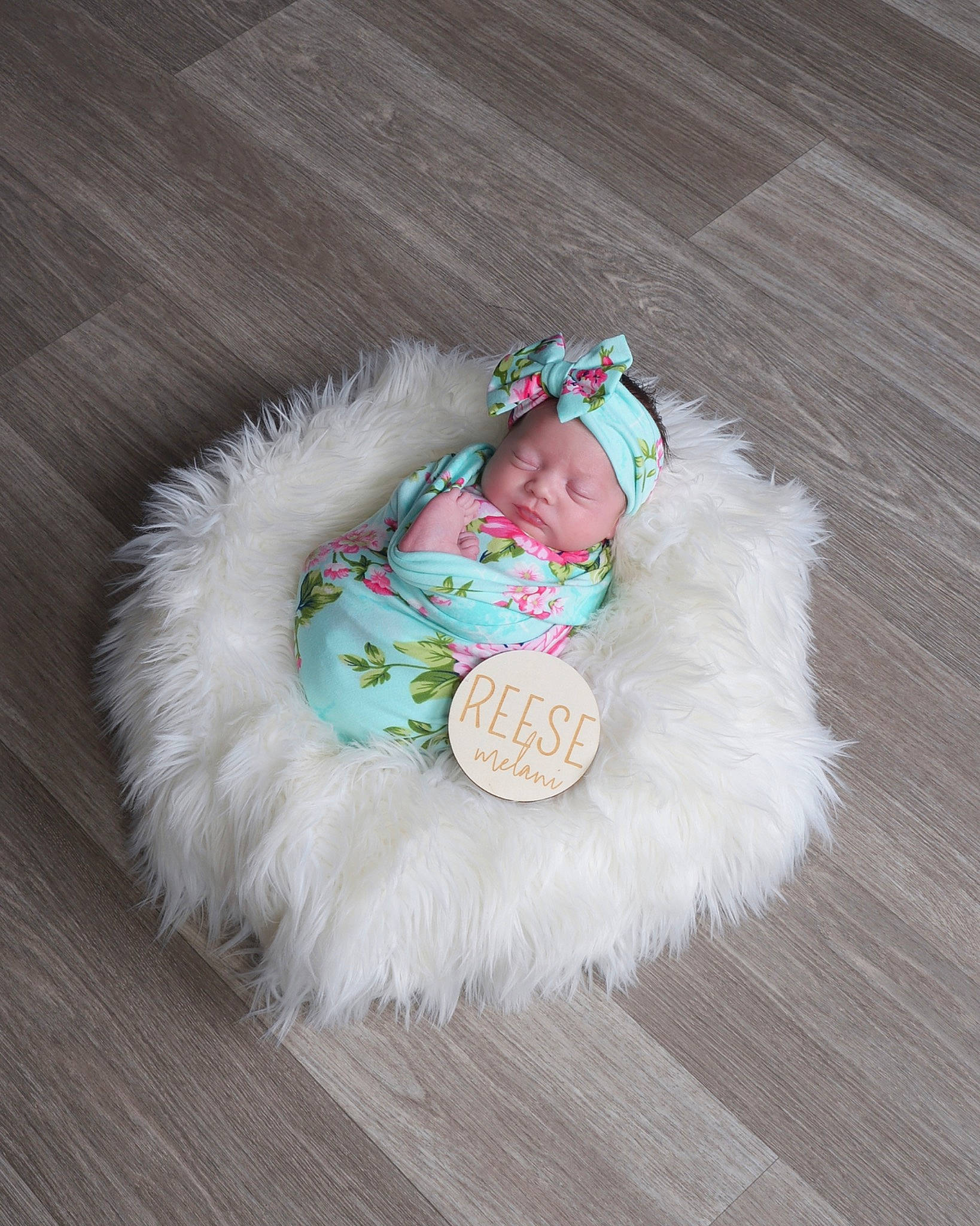 Reese is registered to the contest to win money with this photo: baby_toddler_clothing, baby_toys, cap, child, circle, costume, costume_hat, event, fashion_accessory, feather, flooring, fur, hardwood, hat, headgear, headwear, person, plush, sleeve, stuffed_toy
