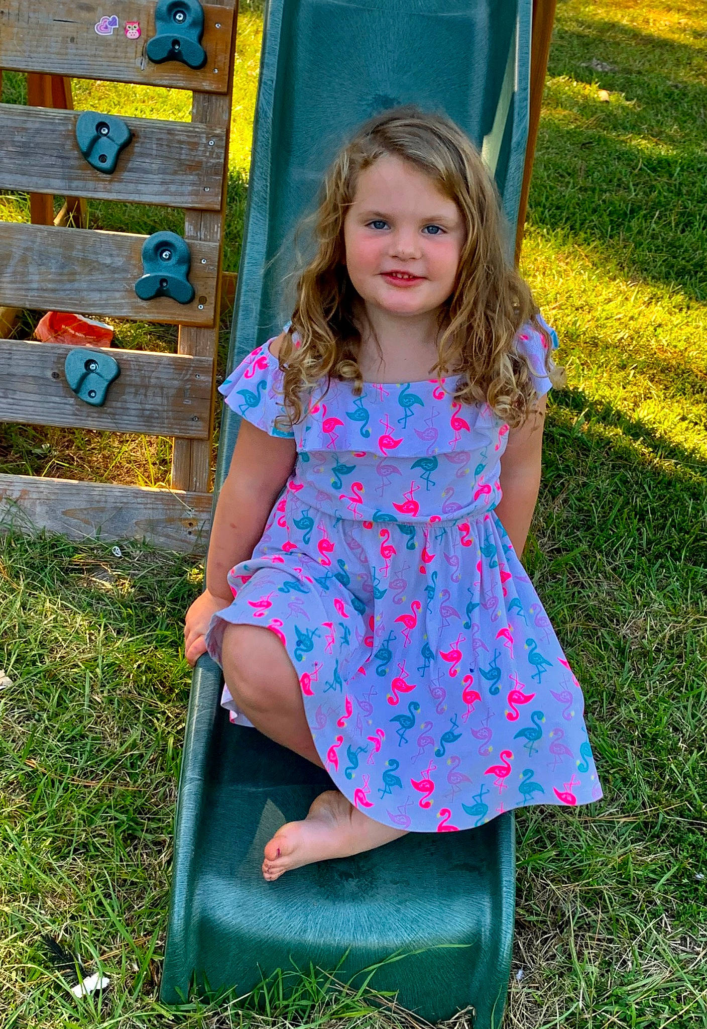 Bella joined the competition — help win amazing prizes! baby_toddler_clothing, blond, child, dress, electric_blue, fun, grass, green, happy, joy, leisure, magenta, pattern, people_in_nature, person, pink, plant, recreation, smile, thigh