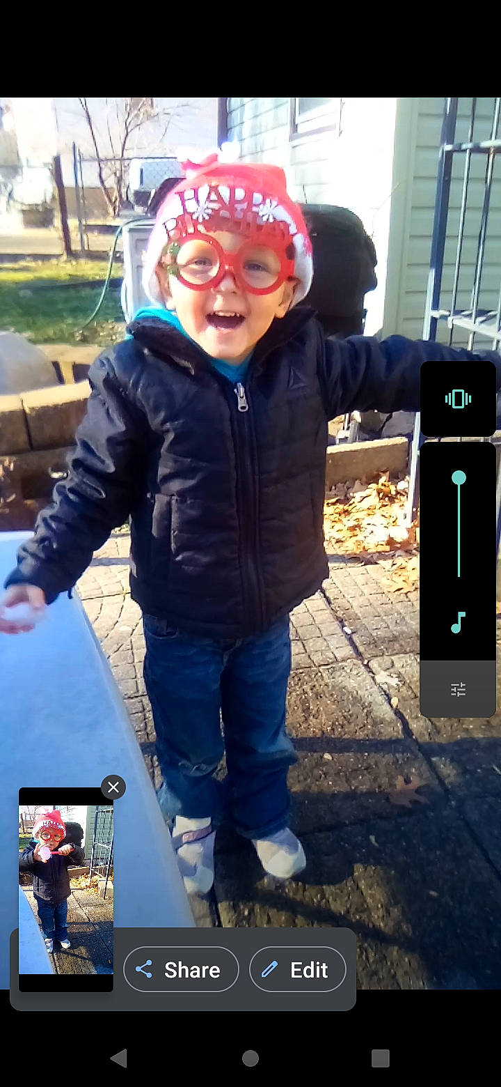 Damon is registered to the contest to win money with this photo: child, communication_device, cool, denim, electric_blue, eyewear, fun, gesture, happy, hat, headwear, leisure, person, personal_protective_equipment, photograph, recreation, sleeve, smile, snapshot, standing