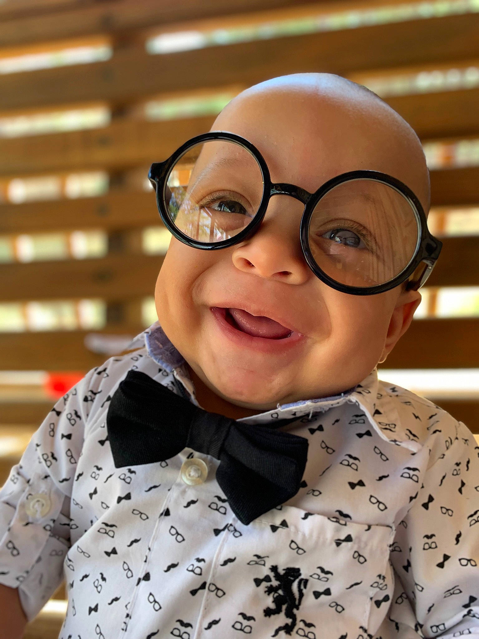 Keegan joined the competition — help win amazing prizes! bow_tie, cheek, child, chin, collar, dress_shirt, eyewear, formal_wear, fun, happy, head, headgear, outerwear, pattern, person, personal_protective_equipment, sleeve, smile, tie, toy