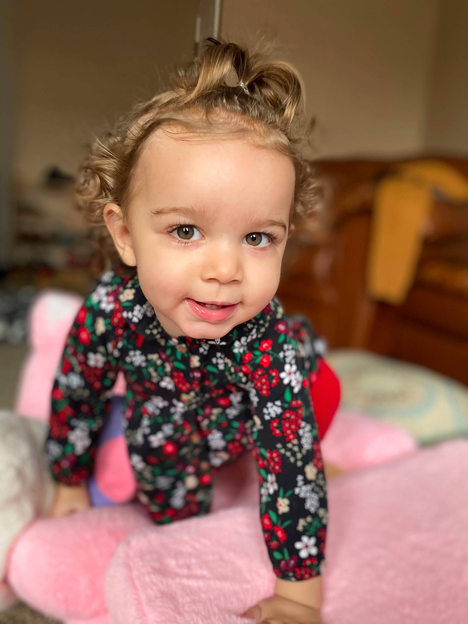 Laurel is registered to the contest to win money with this photo: baby, baby_toddler_clothing, cheek, chin, dress, eye, face, finger, flash_photography, flooring, hair, hand, happy, human_body, iris, leg, person, skin, sleeve, smile