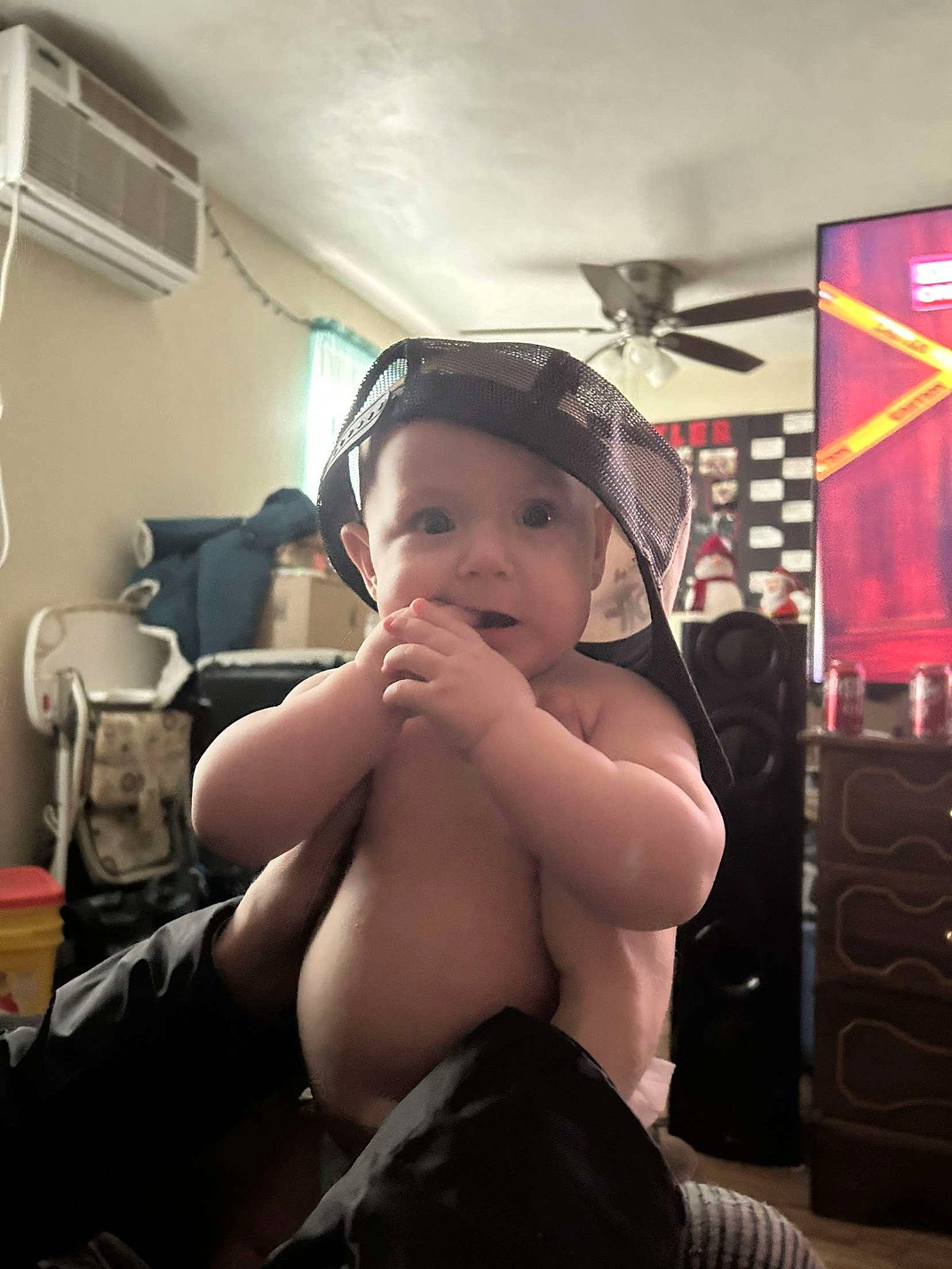 Ivory is registered to the contest to win money with this photo: abdomen, audio_equipment, baby, baby_products, barechested, chair, chest, child, comfort, event, eyewear, fashion_accessory, flash_photography, fun, happy, headwear, luggage_and_bags, person, personal_protective_equipment, sitting