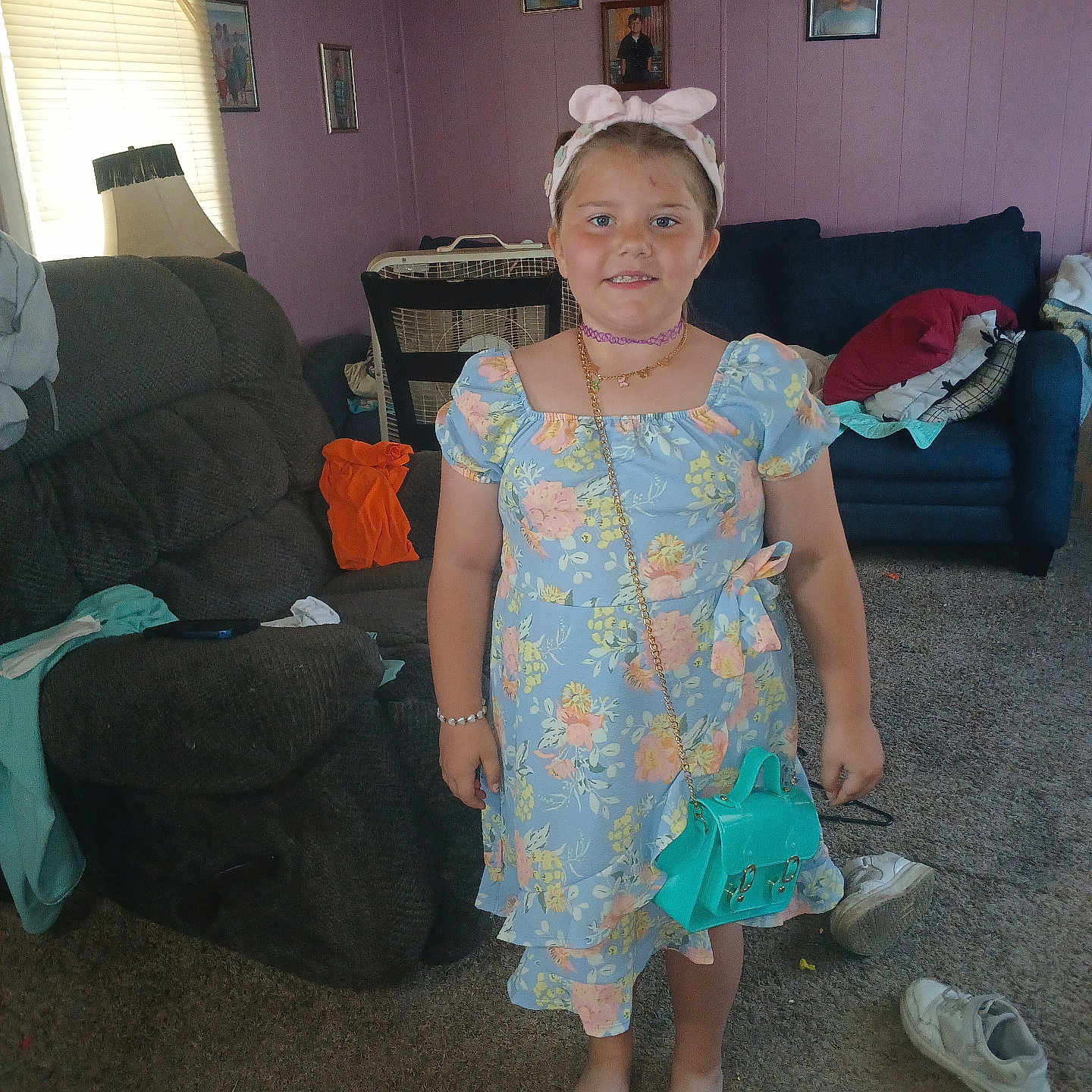 Alexis is registered to the contest to win money with this photo: architecture, art, building, child, clothing, couch, face, female, footwear, furniture, girl, head, indoors, livingroom, painting, person, photography, portrait, room, shoe