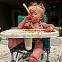 toddler, child, high_chair, chocolate, messy, spoon, face, food, eating, smudged, mess, indoor, person, foot, legs, table, plastic, happy, cute, hair