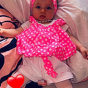 Diana a rejoint le concours — aidez-le/la à gagner de superbes lots ! baby, child, infant, pink_clothing, headband, polka_dot, tights, pillow, bedroom, cute, portrait, indoors, resting, soft_toys, heart_emoji, fabric, pattern, comfort, young_child, relaxation