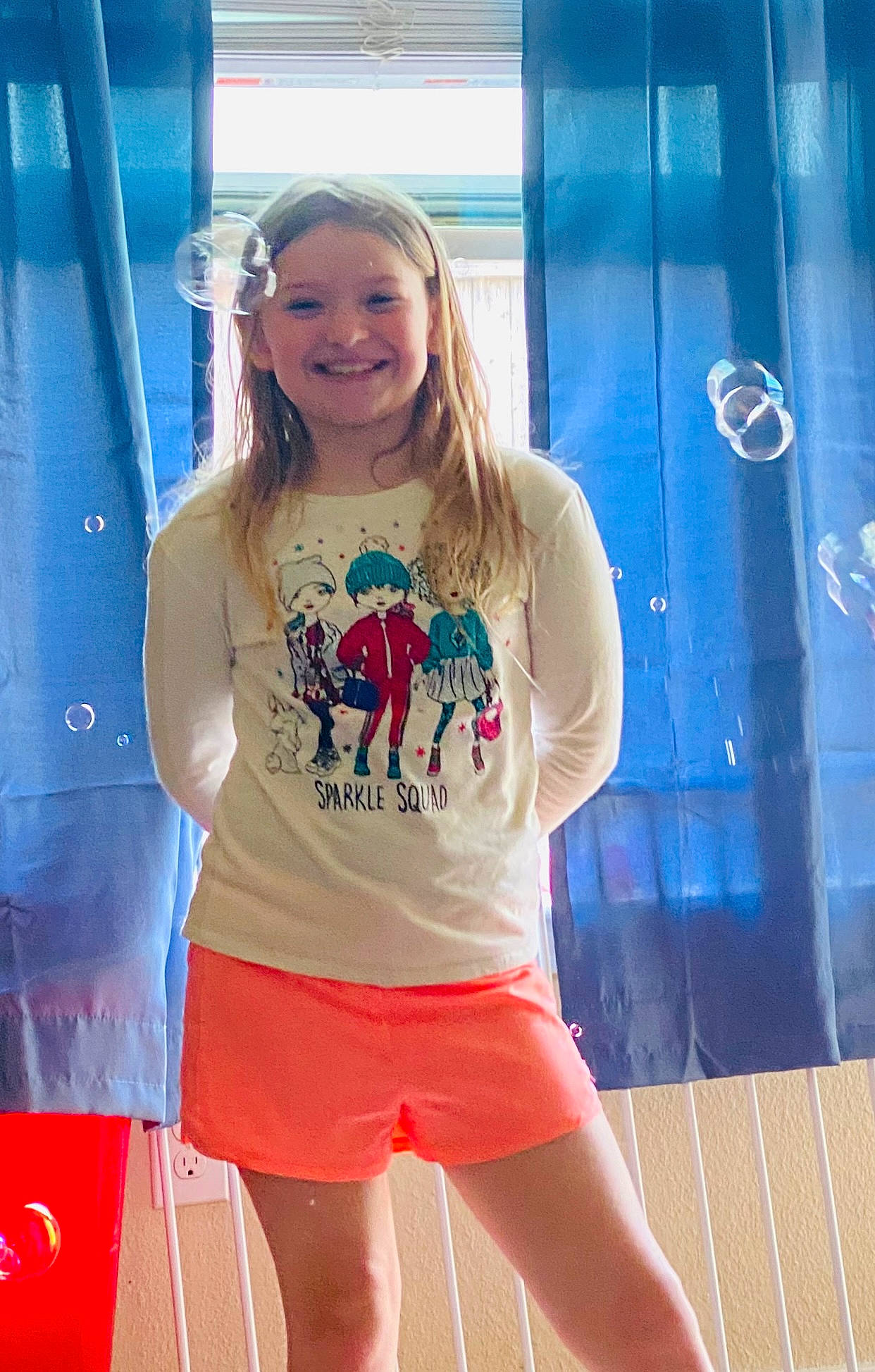 Lailinn is registered to the contest to win money with this photo: abdomen, blue, clothing, electric_blue, hair, happy, human_leg, joint, joy, knee, leisure, long_hair, person, shorts, shoulder, sleeve, smile, sportswear, t_shirt, thigh