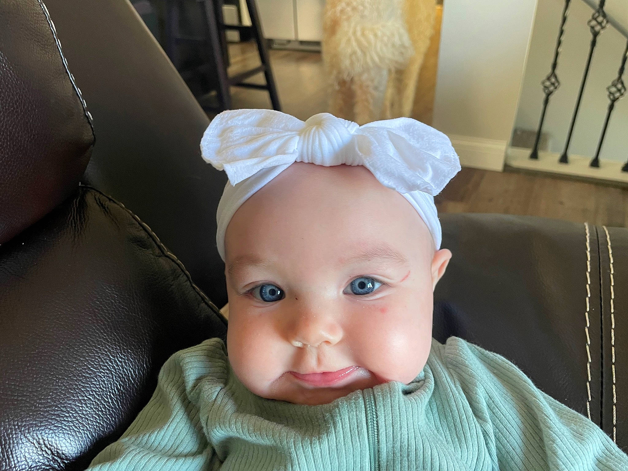 Oakleigh joined the competition — help win amazing prizes! baby, baby_toddler_clothing, car_seat, cheek, child, comfort, costume_hat, eyebrow, eyelash, fashion_accessory, linens, nose, person, room, toddler, wood