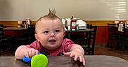 Oaklen joined the competition — help win amazing prizes! baby, child, toy, table, indoor, restaurant, spiky_hair, happy, smiling, furniture, chairs, lighting, casual, dining, red_shirt, playful, person, face, cute, infant